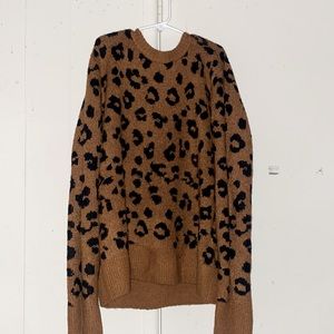 Selling a sweaters or condition and has been cleaned and colors blk/brown